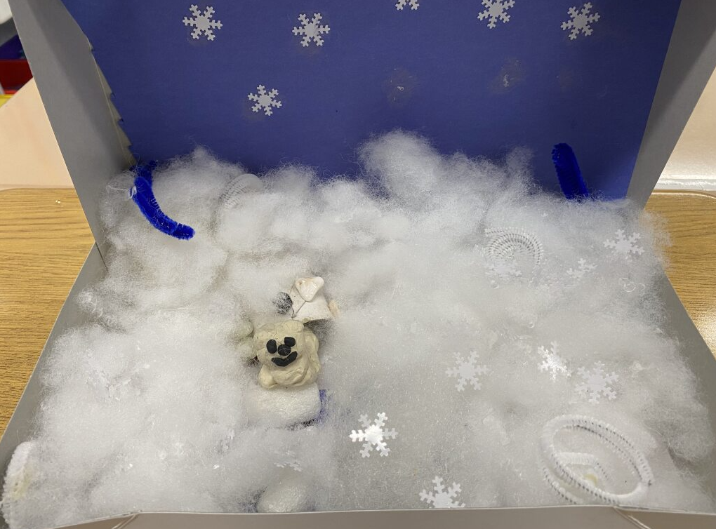 clay polar bear in it's habitat - snowy field