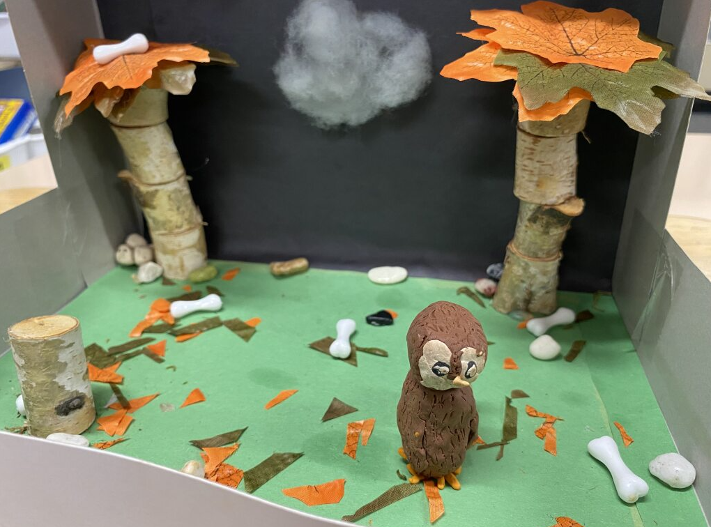 Clay owl in it's habitat - forest