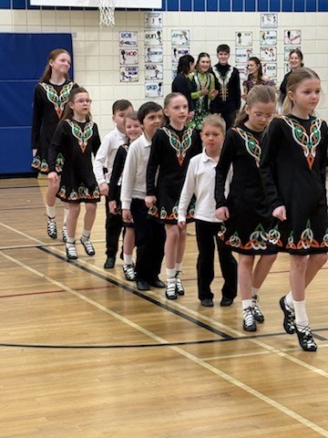 McConnel Irish Dancers perform in a school gymnasium There are approximately 12 dancers