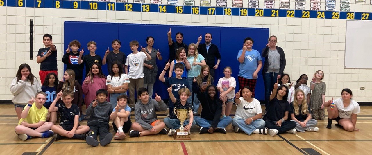 J.R. Reid School Patrols pose with CAA and BPS, along with their patrol teacher, Mrs. A. Thiessen