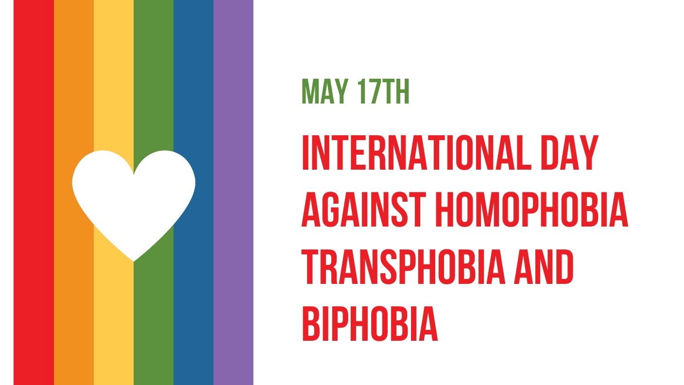 A rainbow coloured ribbon and a white heart with text that reads “International Day Against Homophobia, Transphobia and Biphobia - May 17, 2024”