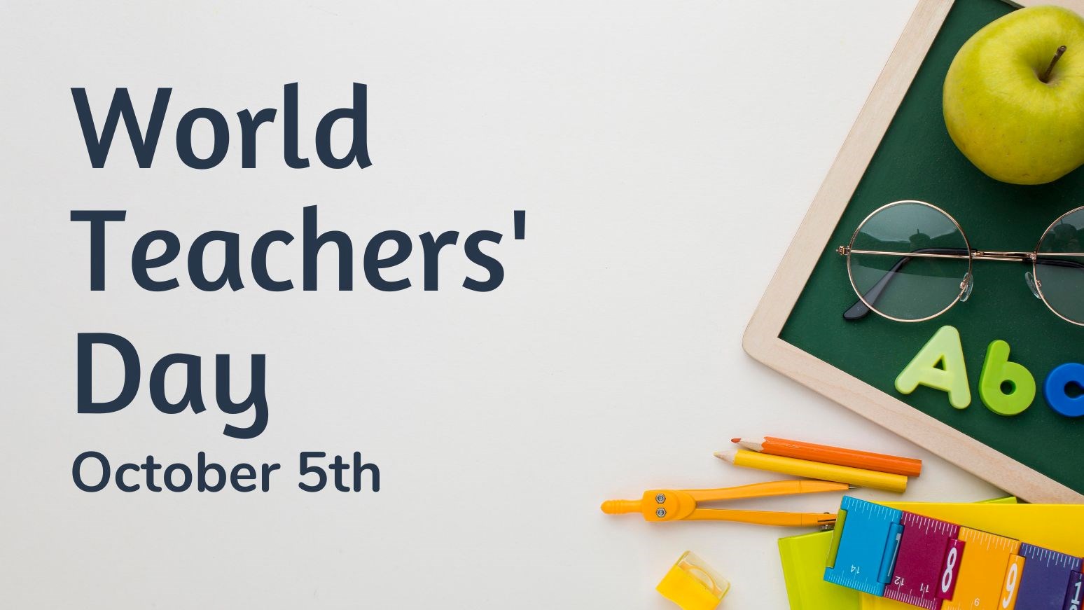 A green chalkboard with school supplies and text that reads “World Teachers’ Day – October 5th”